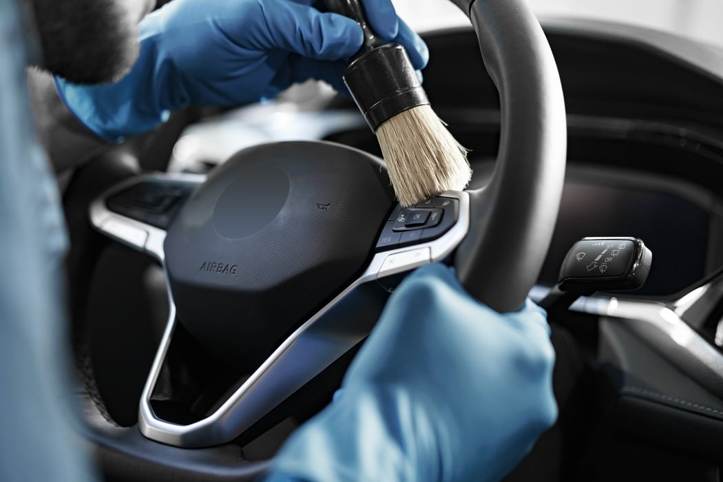 Car owner avoiding damaging cleaning methods with help from Cab Detailing NJ